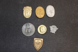A Collection of Third Reich day badges, to include various propaganda examples, Police, Hitler,