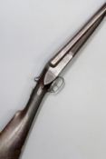 A double barrelled 12-bore box lock ejector gun by Carr Brothers, 30inch sighted damascus barrels,