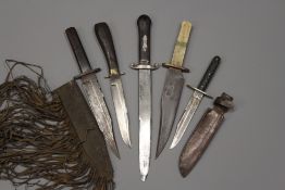 A large hunting knife, the blade stamped Graveley & Wreaks, with white metal mounted hilt and