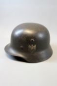A Third Reich Army M40 single decal helmet, the black/blue steel skull with single decal to left
