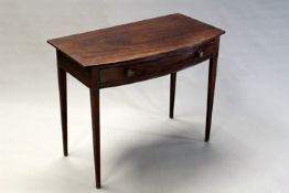 A Regency mahogany bowfront side table with frieze drawer, on square section tapering legs, 92cm