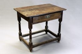 An 18th Century oak small side table with frieze drawer and stretcher base, 79cm wide.