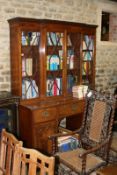 An early 19th Century mahogany and box strung breakfront secretaire library bookcase,158cm wide x