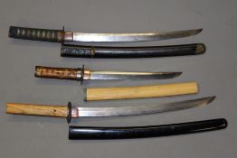 A Japanese Wakizashi, 40cm blade with one mekugi-ana, plain iron tsuba, fully bound tsuka, contained