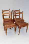 A set of four Victorian Arts and Crafts style oak side chairs with stuffover seats. (4)