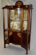 Shapland and Petter of Barnstaple: an Art Nouveau mahogany and inlaid display cabinet, the raised