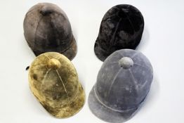 Four various velvet riding hats, comprising two Patey and two Lock. (N.B. These hats do not comply