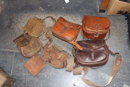 Seven leather cartridge bags together with a Blackwater discreet weapons case, shooting mat/case,