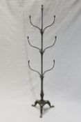 A 19th Century cast and wrought iron hall coat stand, each branch with acorn finial, 197cm high.
