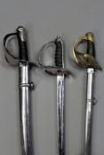 A Swedish cavalry trooper`s sword, complete with scabbard together with an 1897 pattern NCO`s