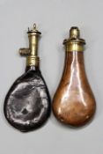 A copper powder flask by Sykes, together with a leather shot bag by Hawksley with Irish top. (2)