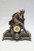 A large late Victorian mantel clock, surmounted with a spelter figure of a knight at rest, with