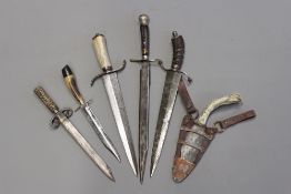 Six various composite horn hilted daggers and sidearms. (6)