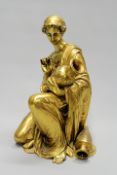 A 19th Century gilt bronze figure of a kneeling classical maiden decorating a vase, probably French,