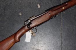 A .303 bolt action P14 service rifle, serial no. W179455. Please note that this item will require