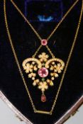 A fine Edwardian yellow metal, seed pearl and amethyst floral necklace contained in its purple