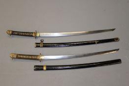A Japanese Kai-Gunto, 66.5cm blade with one mekugi-ana, characteristic brass mounts, black painted