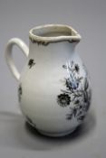 An 18th Century Chinese sparrow beak small jug with gilt highlighted decoration.