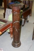 A Cornish serpentine pedestal with moulded form base and capital, 120cm high.