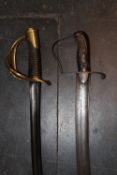 A French 1796 Pattern Light Cavalry Trooper`s sabre, together with a French model 1822 sabre. (2)
