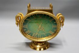 Patek Philippe: a rare gilt brass cased solar powered quartz desk clock in Regency style swan neck