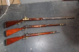 Three crude percussion guns; two of military style, the last of sporting form. (3)