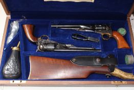 A cased brace of deactivated commemorative US cavalry Uberti Colt Navy revolvers, retaining most