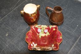 A Doulton Silicon ware jug, finished to resemble copper, with riveted decoration, impressed number