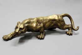 A bronze figure of a stalking panther, bears foundry mark and signature “Milo”.
