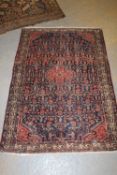 A Persian Hamadan rug,163 x 112cm.