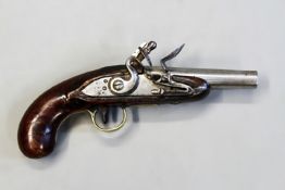 A flintlock travelling pistol, 4inch barrel, plain lock, half stocked with brass mounts, bag