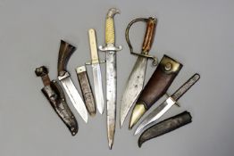 A Sheffield made hunting knife, white metal hilt with two piece ivory grips together with a pistol