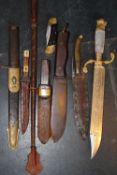 Eight various hunting knives, some with scabbards and composite. (8)