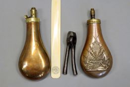 A good copy of a Colt powder flask together with a Dixon copper flask, a Kynock salesman`s