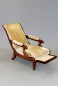 A William IV mahogany framed reclining library chair by Daws Patent with ratchet mechanism and