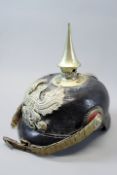 A First War Prussian NCO`s picklehaube, the black leather skull with brass fittings including