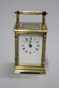 A large late Victorian carriage clock, with French strike repeat movement cased in period leather