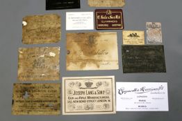 Thirteen various gun case trade labels, to include H. Mabihon, William Atkinson, John Rigby, T.