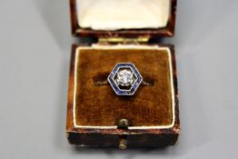 An Art Deco 18ct gold sapphire and diamond set ring.