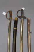 A Cossack sabre, 86cm slightly curved blade stamped 1910 at the forte, regulation brass hilt with