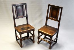 A pair of early 18th Century panel back side chairs with bobbin turned front legs and stretchers. (