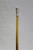 A late 19th/early 20th Century Oriental rhino horn riding crop, the white metal mount embossed