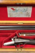 A cased double barrelled 12-bore Purdy hammer gun, serial no. 8523 for 1871, 30inch sleeved barrels,