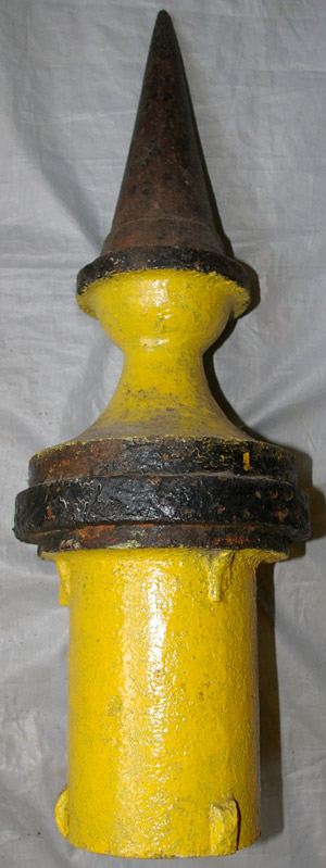 Tramways cast iron Finial measuring approximately 20½" tall with a mid-section skirt and pointed `