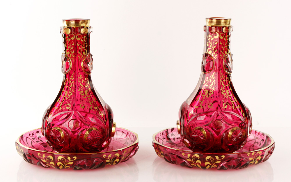19th century pair cranberry Bohemian glass carafes, with matching under plates, blown and cut