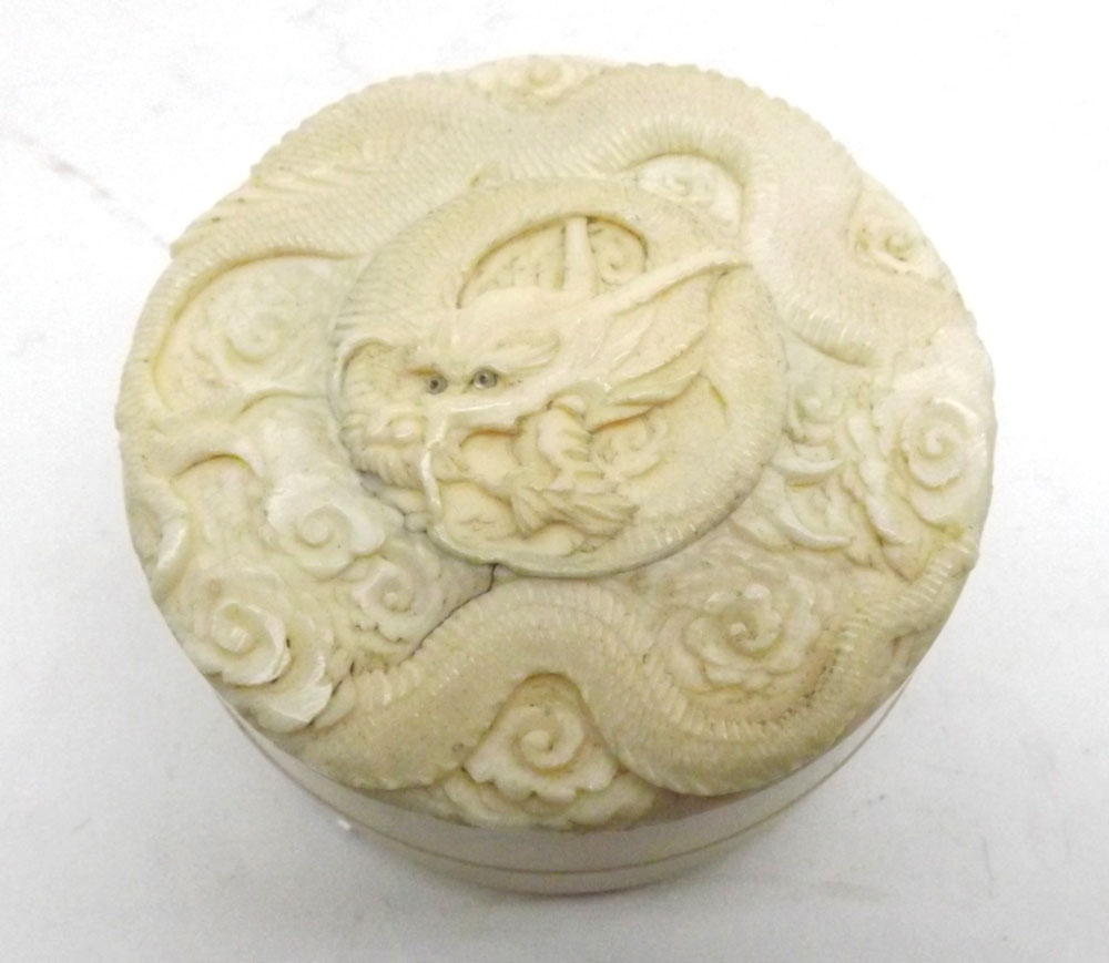 A circular carved Ivory Box with pull-off cover, the lid carved with a coiled dragon, 2 ½" diameter - Image 2 of 6