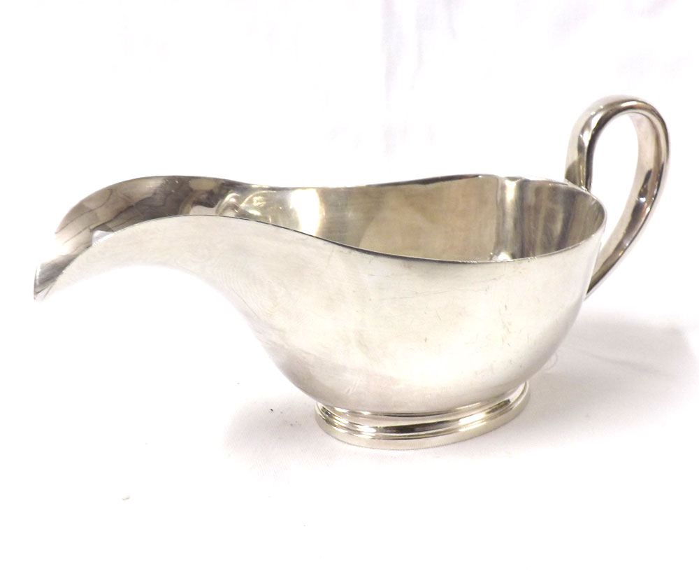 A heavy quality Silver-plated Sauce Boat of plain design, 9? long