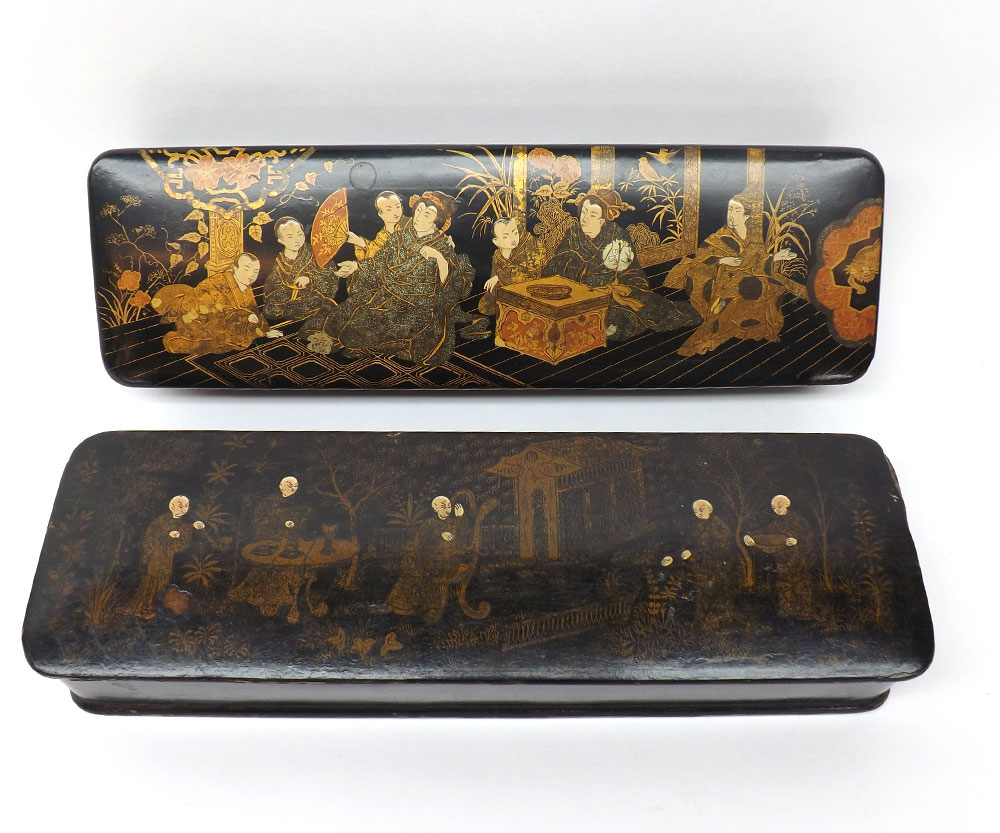 Two Oriental lacquered and Japanned Glove Boxes, the lids both decorated respectively with exterior