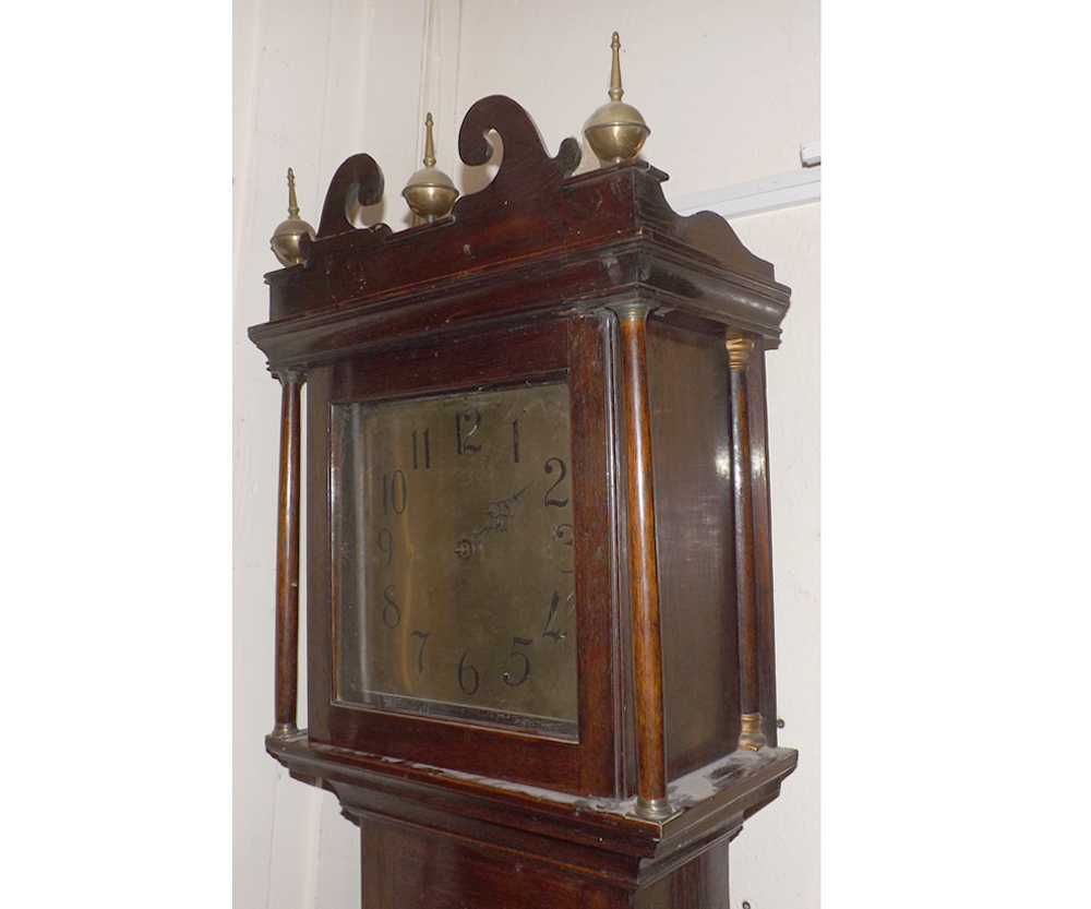 An Oak Long Case Clock 18th/19th Century, the square Brass dial with Arabic chapter ring, swan neck