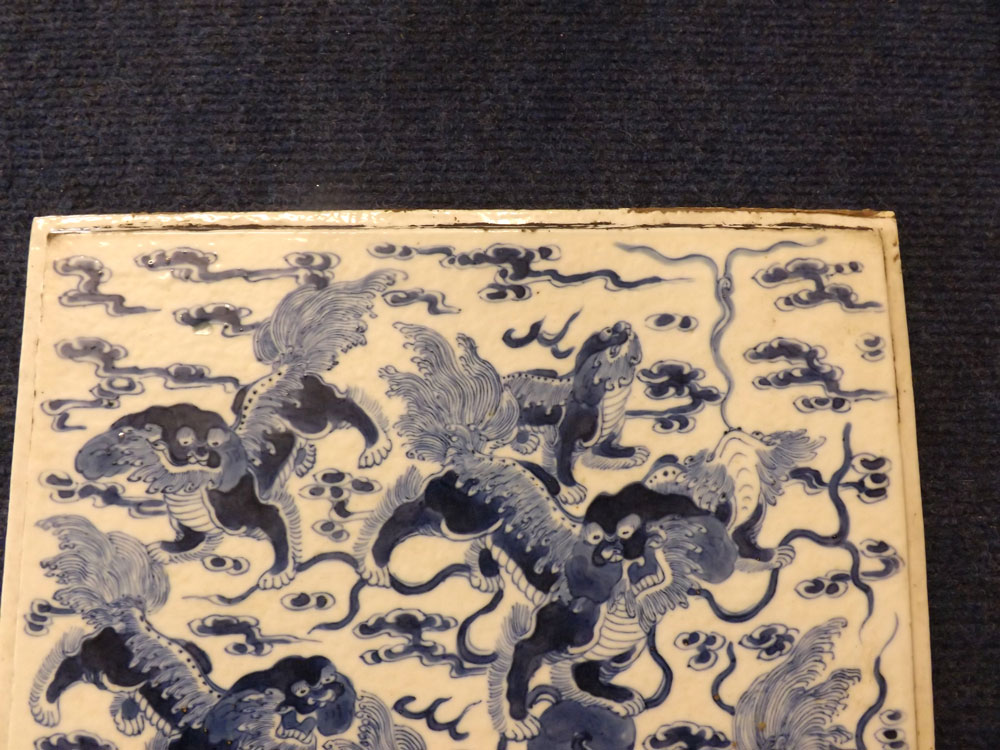 A Chinese large Tile, decorated in under glazed blue with Kaolin amongst smoke clouds, 19th - Image 2 of 5